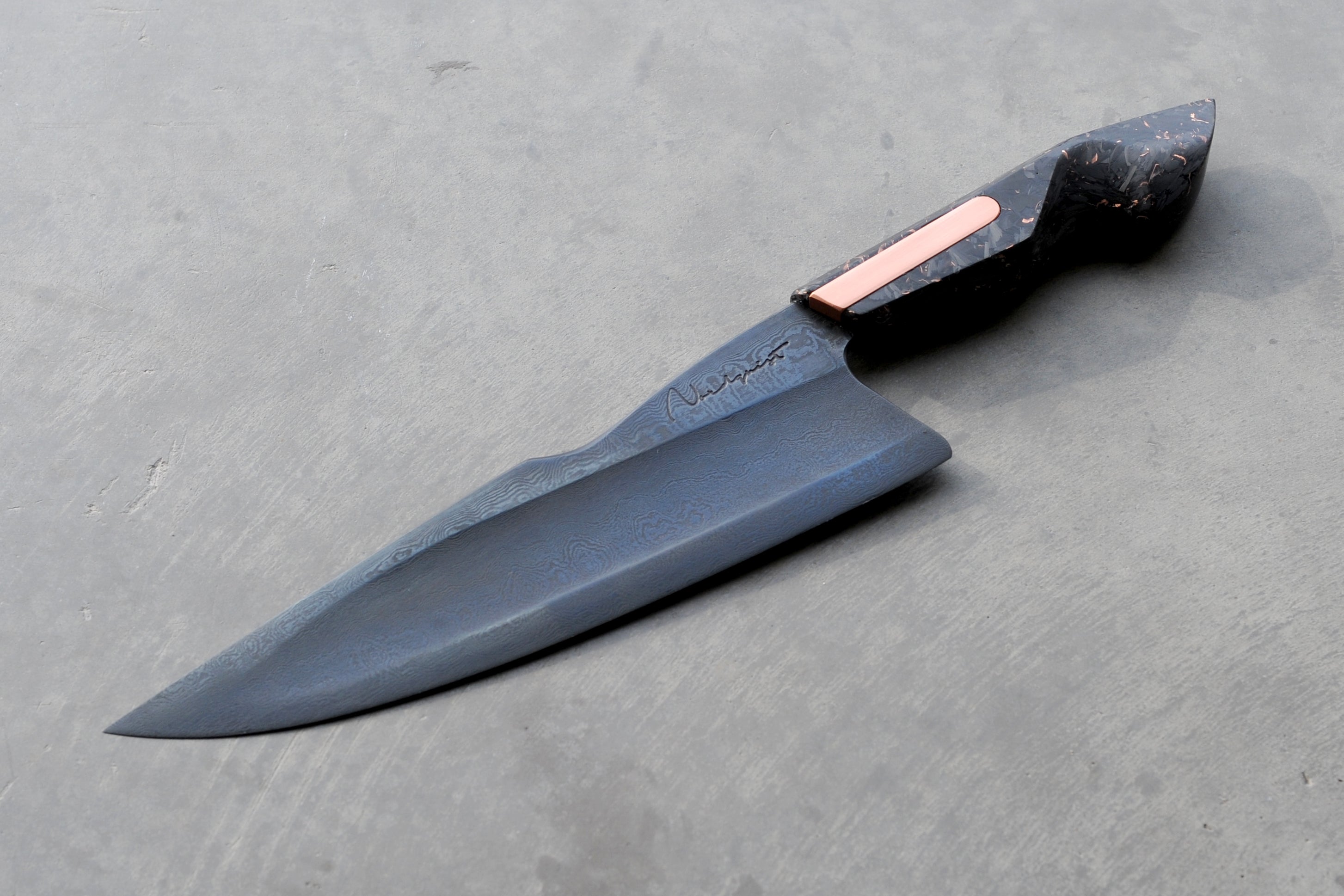 Watch how this breathtaking Copper Damascus knife is forged from